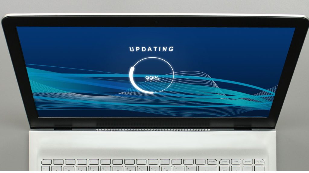 a laptop in a software update with 99% complete