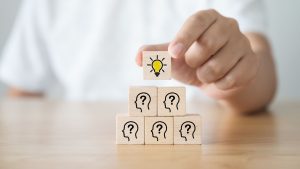 blocks on a table that represents a workforce and online learning for professional development